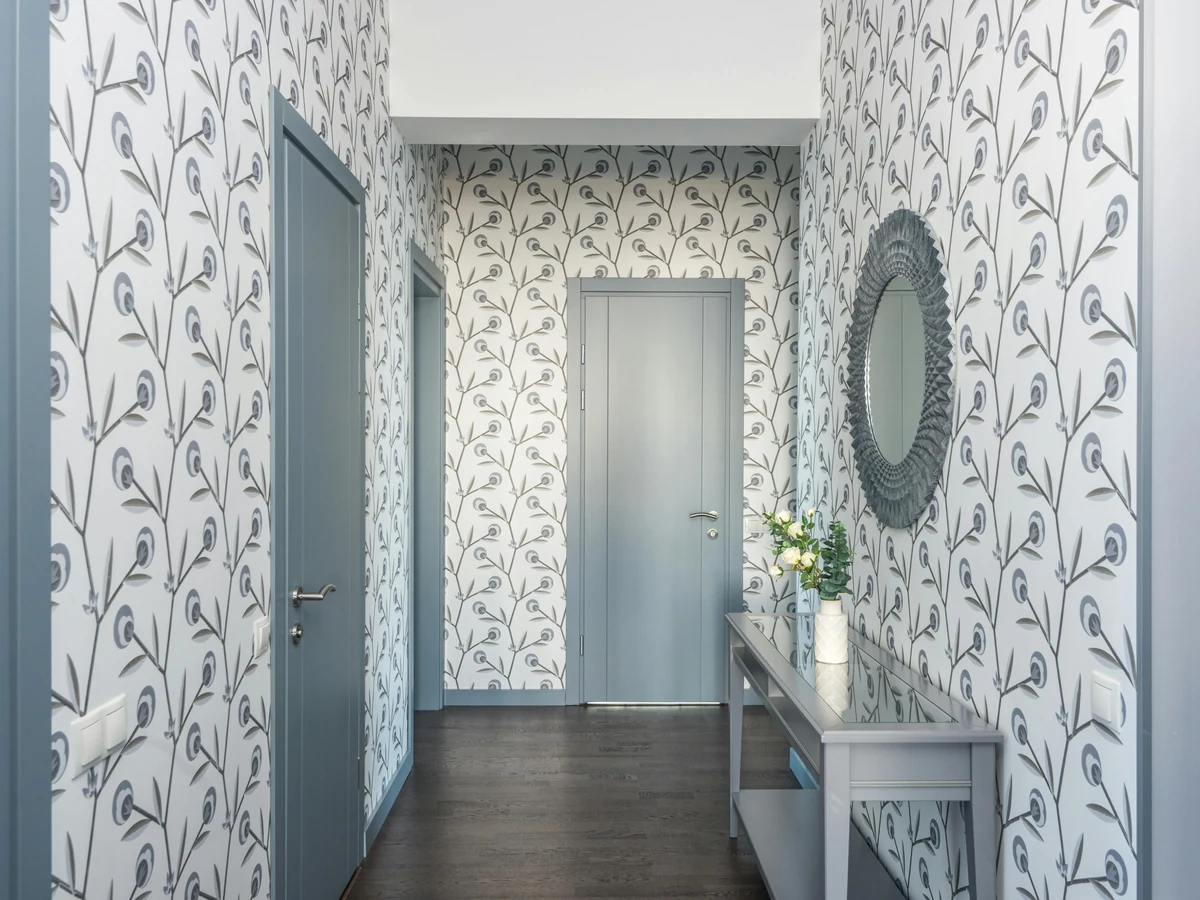 Hallway with bird pattern wallpaper installed in Reading by Reading Decorators