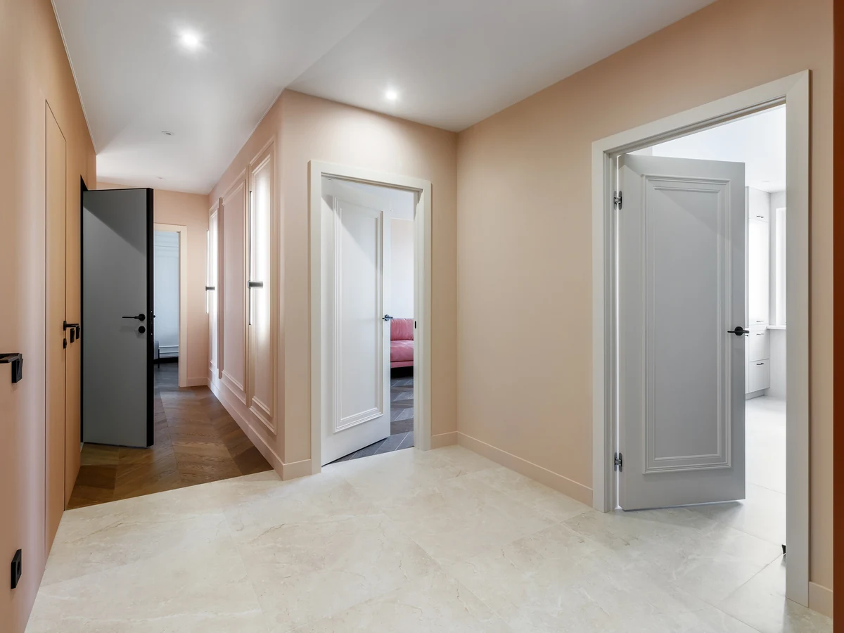Peach-coloured hallway corridor decorated by Reading Decorators in Reading