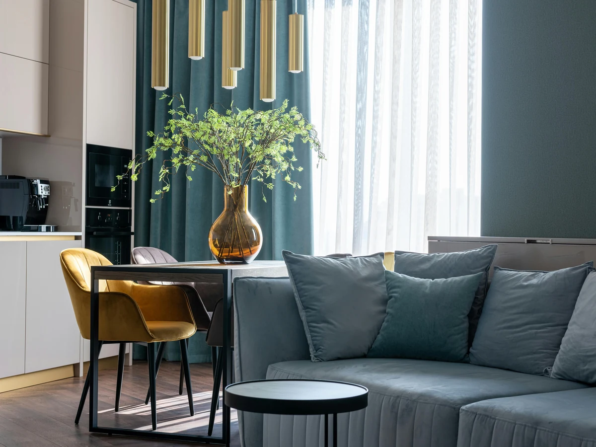 Teal green painted living room in Wokingham showing decorating cost quality by Reading Decorators